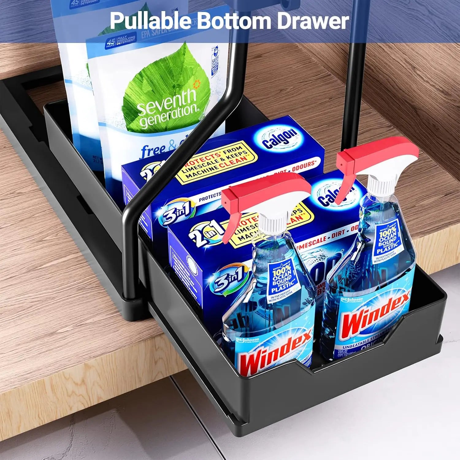 Black pullout kitchen organizer with cleaning supplies on a wooden countertop